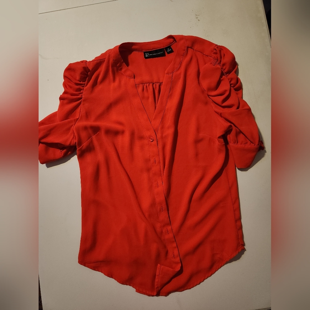 New York & Co size medium orange button up with puffy sleeves